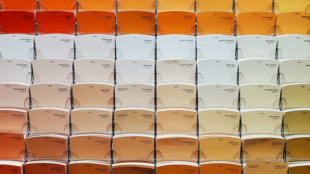 Paint chips in whites, reds, and oranges