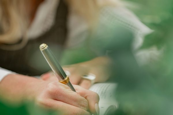 woman writing to do list